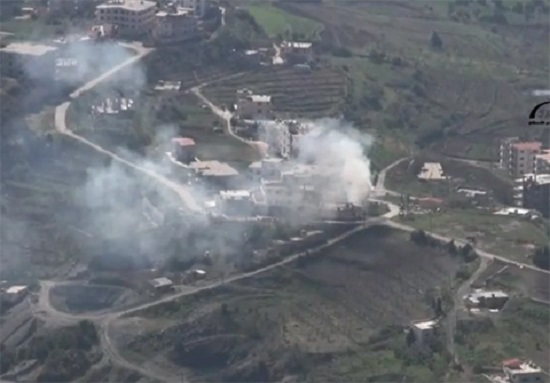 Smoke rises from the town center in Kessab, Syria, after days of attacks by extremist militants crossing over from Turkey. March, 2014.